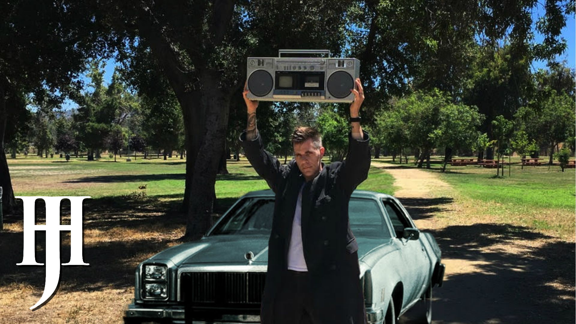 Jeff Holding Boom Box